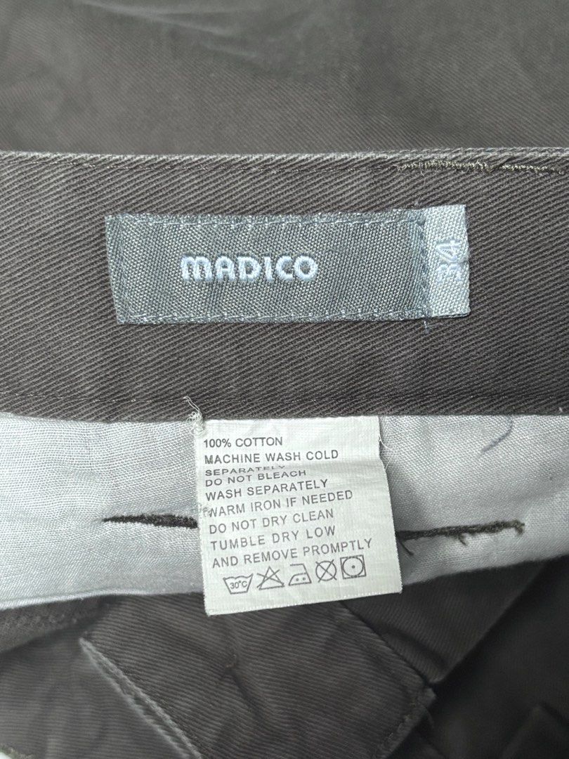 Madico Grey Cargo Pants Size 34 (Category: Jeans) located in Bacoor. Submitted by calvinmanzano13 (Listing ID 1466689621, Image 2). Description: - L = 38.5” | W = 34” - Color: Grey - Material: 100% cotton twill fabric - Fit: Straight leg with belt loops - Pockets: Utility pockets on the sides with zipper and button closure - Details: Contrasting fabric strap details on pockets and back Notes: ☑️ Hand washed ☑️ Polished ☑️ Steam ironed.