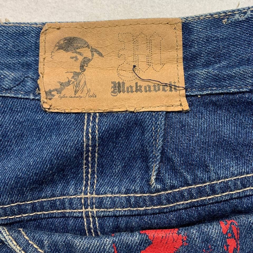 Makaveli Branded Denim Jeans (Category: Jeans) located in Mandaluyong City. Submitted by theroom501 (Listing ID 1466601702, Image 3). Description: Makaveli Branded Denim Jeans Style Code: Size on Tag: 38 Color: Blue Condition: Good pre-owned condition with a heavily distressed vintage look. Flaws/Issues: Altered/Waistlin and some loose stitching around the inner label/tag area stain not sure if removable. Flat Lay Measurements: Pit to Pit: 36 inc