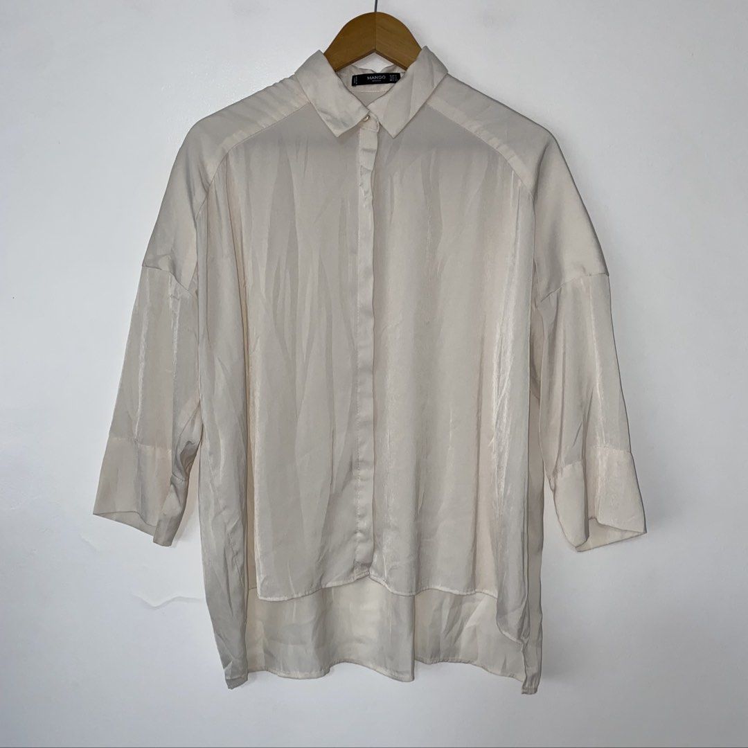 SALE‼️MANGO satin top (Category: Blouses) located in San Jose del Monte. Submitted by mamiracky (Listing ID 1466613979, Image 1). Description: Last price posted In good condition No flaws No when worn .