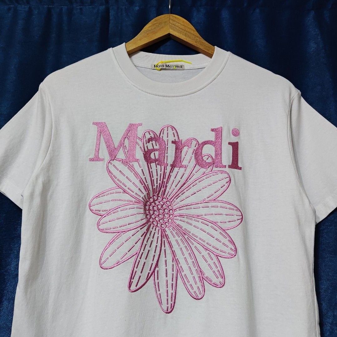 MARDI MERCREDI EMBROID LOGO TEE (Category: Shirts) located in Makati City. Submitted by upcycled.closeth (Listing ID 1466588290, Image 2). Description: - Authentic Mardi Mercredi product - White, short-sleeved - Size: Large (women's) - Like new - Authentic - flaws: no flaws - Excellent condition - Need wash, fresh from bale - Features design of Mardi Mercredi embroidery logo - Material: 100% cotton !!STILL NEGOTIABLE!!.