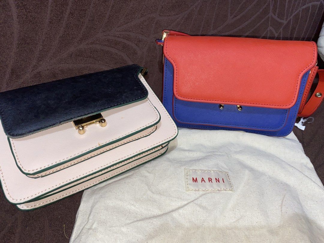 Marni Small Trunk Bag Bundle (Category: Luxury Bags & Wallets) located in Quezon City. Submitted by jamie_87 (Listing ID 1466742929, Image 1). Description: FAST BREAK LETTING-GO SALE 🥲 Rank: C (Para sa willing lang to have these fixed) 2 Small Marni Trunk Bags Price is negotiable (PM me now!) Pros: * No stickiness or powdery residue * Complete straps * With dust bag/s Cons: * Vintage storage smell * No laundry tags inside * Glue residue and yell