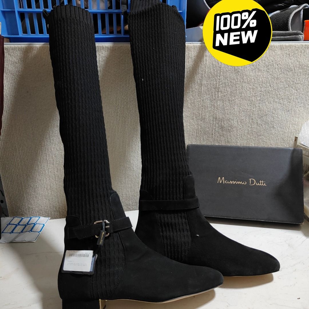Massimo Dutti Boots EU 42 | MD-1005144306416 (Category: Boots) located in Paranaque City. Submitted by silverphoenix.00302e (Listing ID 1466697094, Image 1). Description: Massimo Dutti Boots EU 42. Upper: goat leather and polyester. Lining: sheep leather. Sole: rubber. Heel height: 2.5 cm. Boot height: 60 cm. Reference: MD-1005144306416..