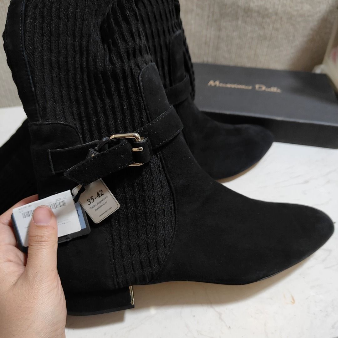 Massimo Dutti Boots EU 42 | MD-1005144306416 (Category: Boots) located in Paranaque City. Submitted by silverphoenix.00302e (Listing ID 1466697094, Image 2). Description: Massimo Dutti Boots EU 42. Upper: goat leather and polyester. Lining: sheep leather. Sole: rubber. Heel height: 2.5 cm. Boot height: 60 cm. Reference: MD-1005144306416..