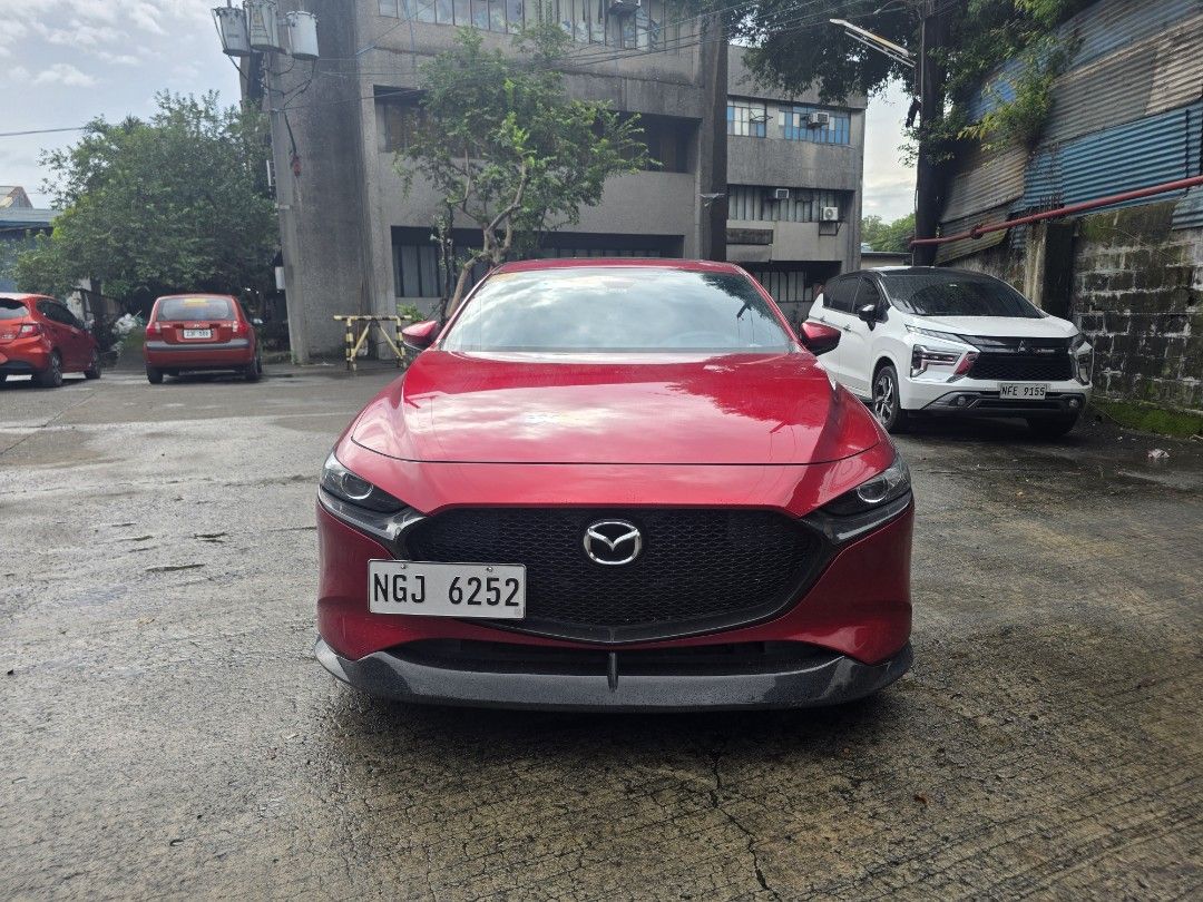 Mazda 3 1.5 Hatchback Deluxe 6AT (A) (Category: Used Cars) located in Manila. Submitted by safecat-4a76 (Listing ID 1466726628, Image 1). Description: FOR SALE: 2020 Mazda 3 Elite A well-kept Mazda 3 Elite in Soul Red, with a clean and tasteful setup. Ideal for someone looking for a stylish, premium daily car without the need for additional upgrades. Variant: Mazda 3 Elite Year Model: 2020 Mileage: 45,000 km Color: Soul Red Wheels: Enkei Mags Ext