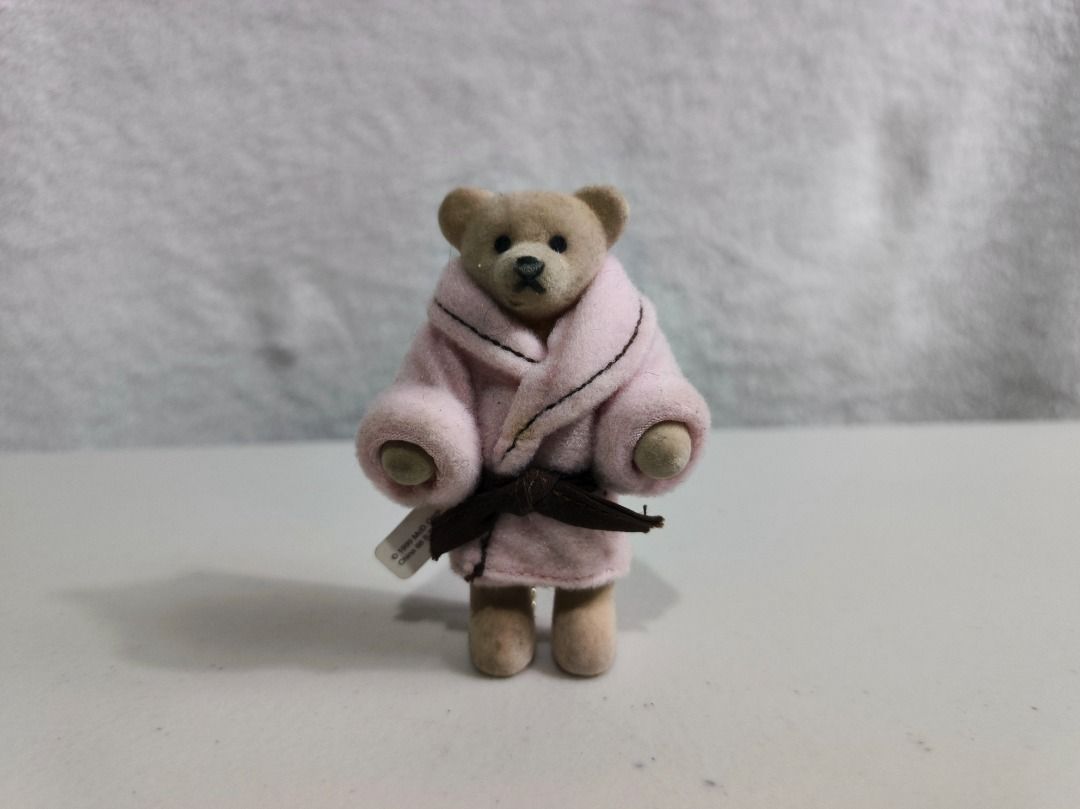 Mcdo Bathing Girl Beth Teddy Bear Keychain (Category: Plushies & Soft Toys) located in San Leonardo. Submitted by burgossanleonardo.12345 (Listing ID 1466691762, Image 1). Description: - Adorable fuzzy flocked bear figurine wearing a tiny pink bathrobe and brown belt - Includes a gold-tone chain on the back, perfect for hanging on bags, pouches, or keys - Features the authentic 'Bathing Girl Beth' white tag with a yellow bear logo - Clean and wel