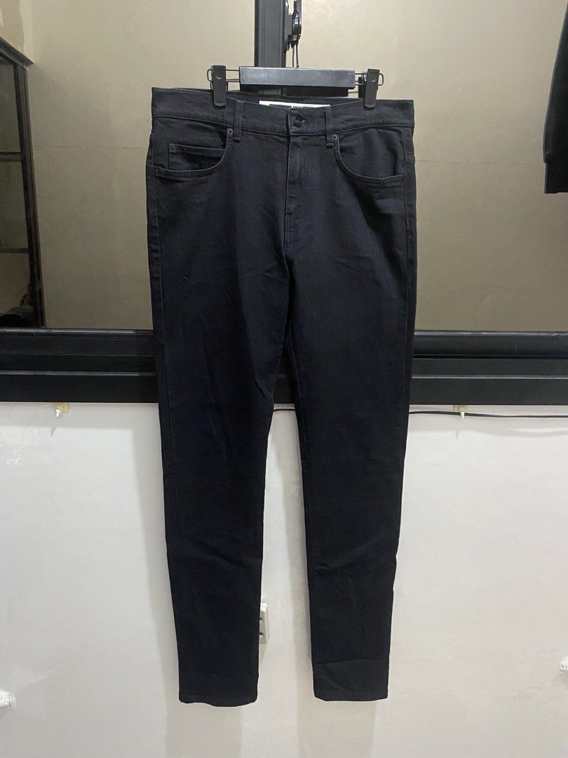 McQ Alexander McQueen Black Jeans Size 32 (Category: Jeans) located in Manila. Submitted by hell_market (Listing ID 1466683572, Image 1). Description: - Brand: McQ - Size: 32 - Origin: Made in Italy - Color/Wash: Versatile dark wash black denim - Fit: Classic straight/slim fit - Details: Branded button, large leather brand patch on the back - Condition: High quality, clean design, ready to wear.