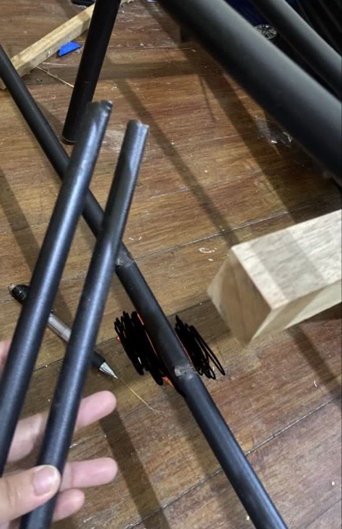 Metal Bed Frame (Category: Bed Frames & Mattresses) located in Manila. Submitted by cams____ (Listing ID 1466598100, Image 2). Description: Sturdy black metal bed frame (Queen Size) - Ornate design on headboard - Multiple support slats for durability - Easy to assemble - Fits queen size mattress - Minor issue at the lower part .