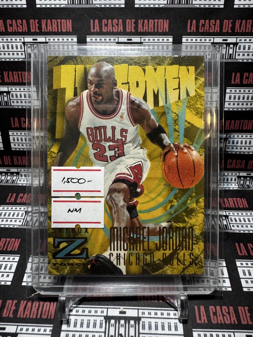 Michael Jordan (Category: Raw Singles) located in Pateros City. Submitted by lacasadekartonph (Listing ID 1466658844, Image 1). Description: - Player: Michael Jordan - Team: Chicago Bulls - Card: SkyBox Z-Force Thunder - Design: Gold background - Condition/Protection: Stored in a hard plastic top loader case - Ideal for basketball card collectors.