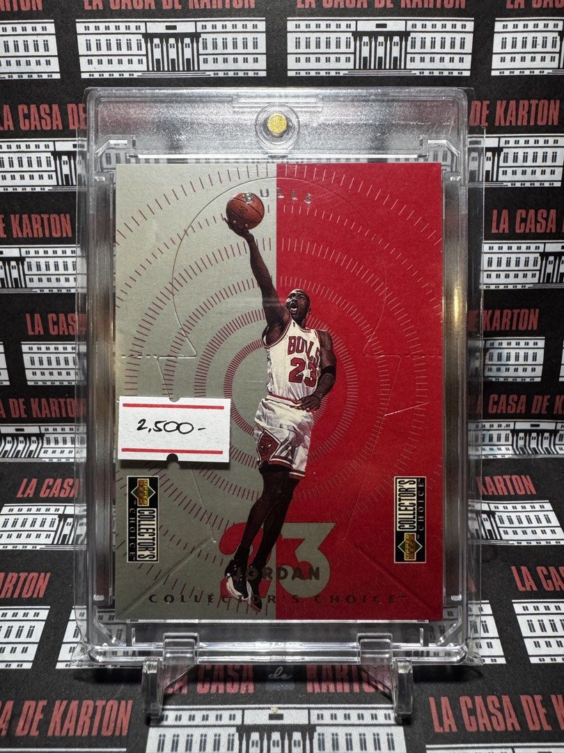 Michael Jordan (Category: Raw Singles) located in Pateros City. Submitted by lacasadekartonph (Listing ID 1466695431, Image 1). Description: - Authentic Michael Jordan Upper Deck Collector's Choice basketball trading card - Features iconic split silver and red background with large number 23 and layup action graphic - Official Upper Deck logo detailing in the corners - Comes securely protected inside a premium clear magnetic hard case - Includes 