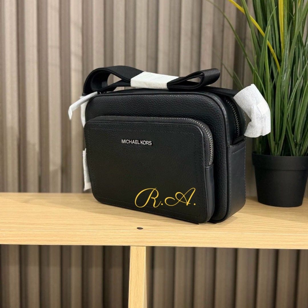 Michael Kors Black Leather Crossbody Bag (Category: Sling Bags) located in Manila. Submitted by rhona30antiquera (Listing ID 1466768633, Image 3). Description: ‼️NEW ARRIVAL‼️ MK Bag for Men • Pebbled leather • 100% leather • Gunmetal hardware • 9”W X 6.25”H X 2.5”D • Adjustable strap: 13”-28” • Exterior details: front zip pocket Original and brand new On hand and ready to ship Can ship nationwide DM us for inquries 📩📩📩📩.