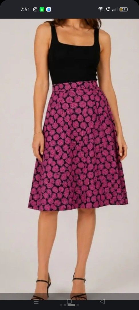 Michael Kors Pink Leaf Print Midi Skirt (Category: Skirts) located in Manila. Submitted by patriciab12636 (Listing ID 1466690307, Image 1). Description: size 30 only - Brand: Michael Kors - Condition: Brand new with tags, never worn - Size: Small - Color/Pattern: Bright pink and black leaf pattern - Style: Mid-rise, pleated A-line midi skirt (hits around knee length) - Closure: Back zip.
