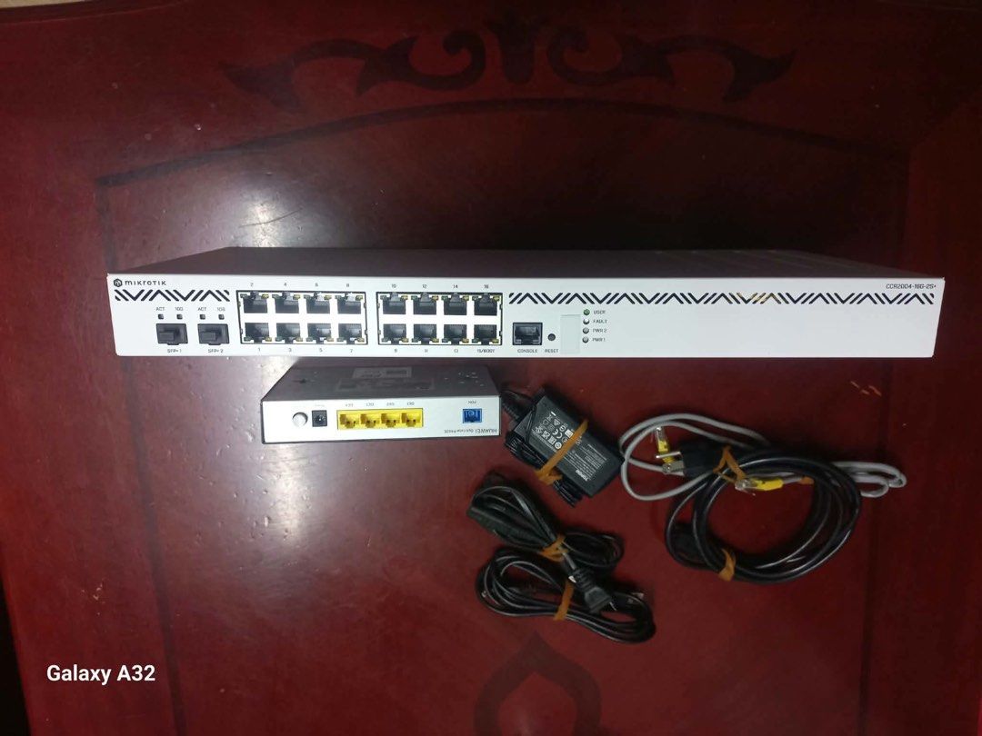 MikroTik CCR2004-16G-2S+ and Huawei GPON Router Bundle (Category: Networking) located in Pasig City. Submitted by jh01116 (Listing ID 1466686595, Image 2). Description: - MikroTik CCR2004-16G-2S+ cloud core router (White) - Huawei OptiXstar P602F GPON ONU included - Features reliable dual power supplies on the back - Comes complete with power adapters and Ethernet cables - Fully functional and ready for deployment.