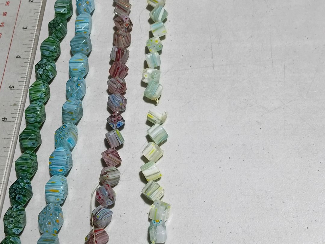 Millefiori Glass Trade Bead Strands (Java/Venetian Style) - 4 strands (Category: Craft Supplies & Tools) located in Marikina City. Submitted by my-an (Listing ID 1466578299, Image 3). Description: - 4 vibrant strands of vintage glass beads - Colors: Green, light blue, purple, and pale green - Shapes: Faceted cube and faceted barrel - Details: Unique millefiori and colorful striped patterns - Condition: Strung on plastic thread - Ideal for: DIY je