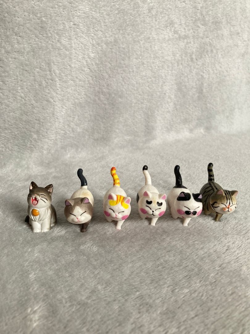 Mini Cat Figures (Category: Figurines & Statues) located in Rizal. Submitted by sheeraay (Listing ID 1466648761, Image 2). Description: -Twistable Head - Variety of poses and coat patterns (tabby, calico, tuxedo, solid) - Detailed facial expressions and painted collars - Cute painted paw prints on the bottom of the tabby - Perfect decor for shelves, desks, or cat lovers - Selling as a complete set.