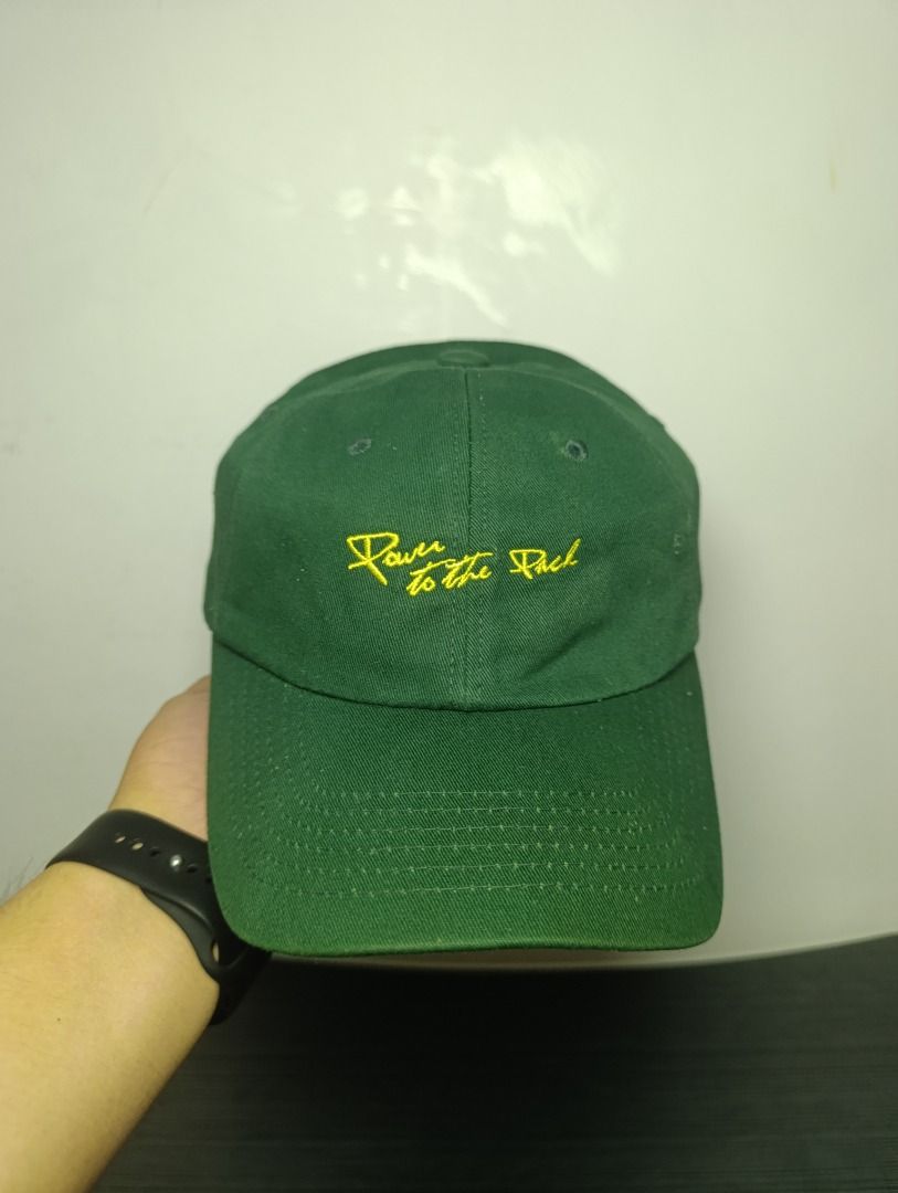 Minnesota Timberwolves NBA Green Cap (Category: Caps & Hats) located in Pasig City. Submitted by firstpick_thrift (Listing ID 1466772884, Image 3). Description: - Authentic green Minnesota Timberwolves hat - Yellow stitched 'Power to the Pack' text on the front - Official NBA patch sewn on the left side - Team name embroidered above the adjustable strap - Secure metal buckle closure - Clean and comfortable cotton material.