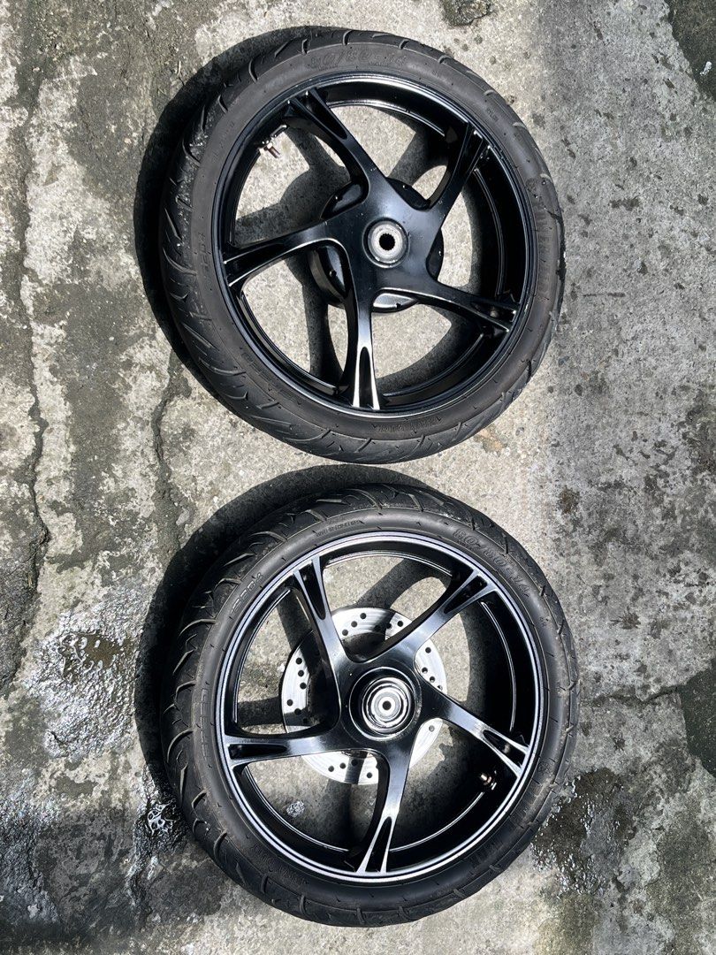 Mio Sporty Stock Mags (Category: Tires & Rims) located in Quezon City. Submitted by rileria (Listing ID 1466566562, Image 1). Description: Makinis pa po, may mga concrete lang na dumikit sa mags 1k fixed price mga bossing.