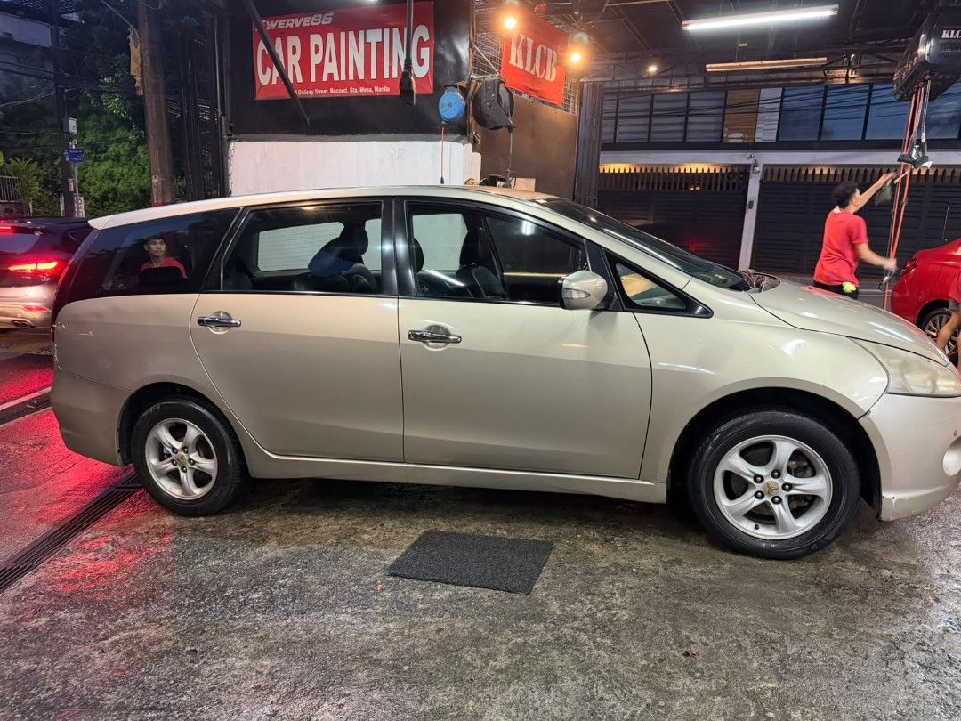 Mitsubishi Grandis 2.4 MIVEC G (A) (Category: Used Cars) located in Pasig City. Submitted by qwerty1026 (Listing ID 1466643433, Image 1). Description: 2011 Mitsubishi Grandis automatic gasoline, 7-seater MPV in champagne gold. Good daily driver with no mechanical issues; engine and transmission are running smooth ✅ 2011 model, 132,991 km mileage, Automatic transmission ✅ No mechanical issues, solid daily driver for family use ✅ Aftermarket touchs