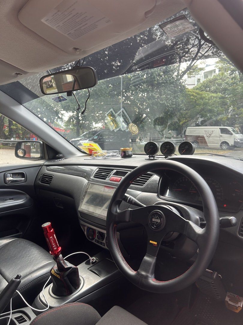 Mitsubishi Lancer 1.6 GLX (M) (Category: Used Cars) located in Singapore. Submitted by ironchoc3 (Listing ID 1466749824, Image 2). Description: new parts added: - new engine mounting - new fly wheel - new clutch and bearing - new drift shaft oil x2 - new radiator - new thermostat - new a/c hose - new power steering hose - new fan belt - new valve cover gasket - new asuki iridium ik20 - new battery w warranty - new coilovers - new rims and tires -