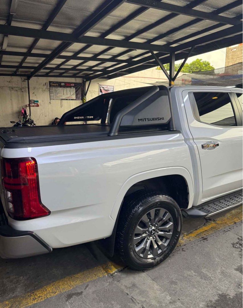 Mitsubishi Triton GLS A/T White Auto (Category: Used Cars) located in Taytay. Submitted by mdbare (Listing ID 1466633765, Image 3). Description: Mitsubishi Triton 2024 GLS AT Full casa Records Prestine Condition Complete Booklet with 2 keys With Rollers Taytay Rizal Area Asking 1.4m slightly Neg.
