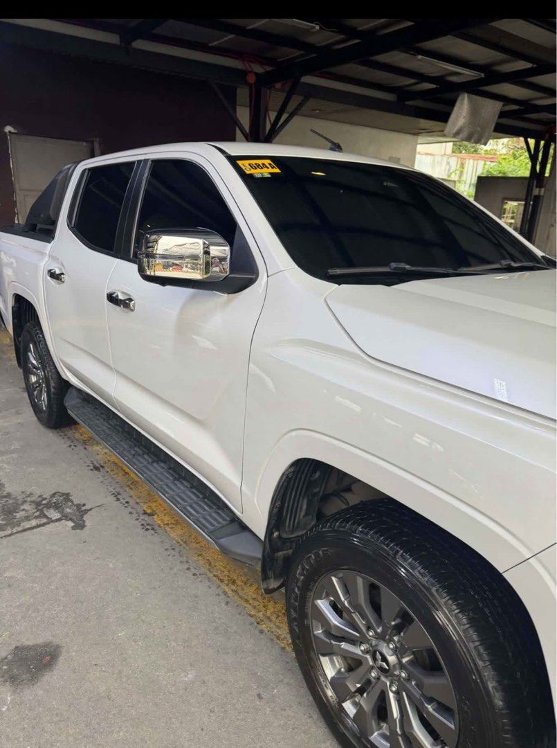 Mitsubishi Triton GLS A/T White Auto (Category: Used Cars) located in Taytay. Submitted by mdbare (Listing ID 1466633765, Image 2). Description: Mitsubishi Triton 2024 GLS AT Full casa Records Prestine Condition Complete Booklet with 2 keys With Rollers Taytay Rizal Area Asking 1.4m slightly Neg.