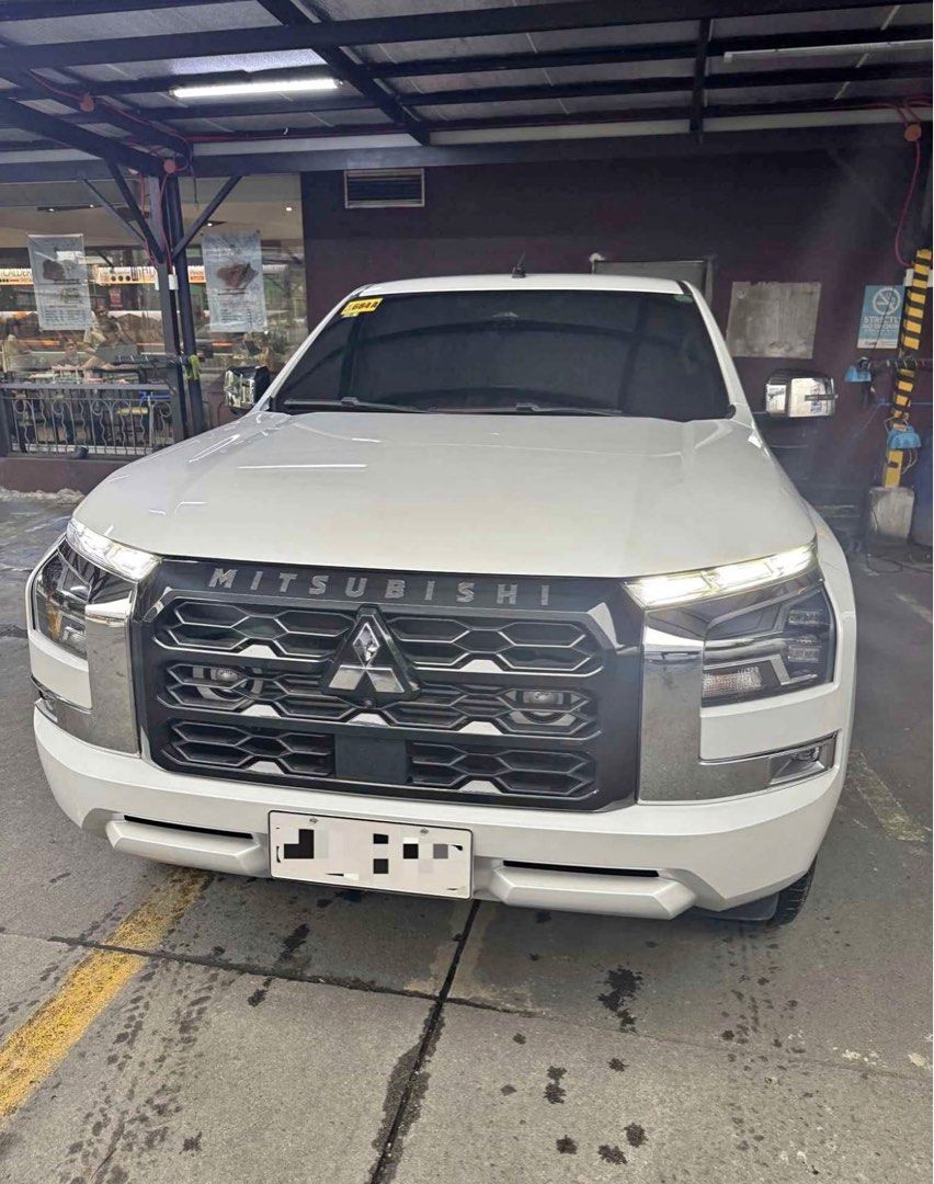 Mitsubishi Triton GLS A/T White Auto (Category: Used Cars) located in Taytay. Submitted by mdbare (Listing ID 1466633765, Image 1). Description: Mitsubishi Triton 2024 GLS AT Full casa Records Prestine Condition Complete Booklet with 2 keys With Rollers Taytay Rizal Area Asking 1.4m slightly Neg.