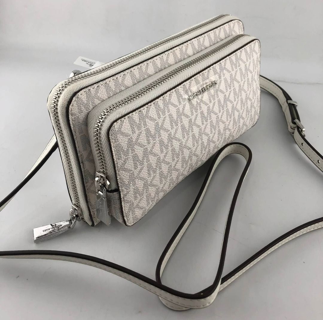 MK Jetset Continental Large Crossbody Bag (Category: Purses & Pouches) located in Manila. Submitted by msddirectfactoryoutlet (Listing ID 1466596301, Image 3). Description: Size 8”W X 4.5”H X 1.75”D .