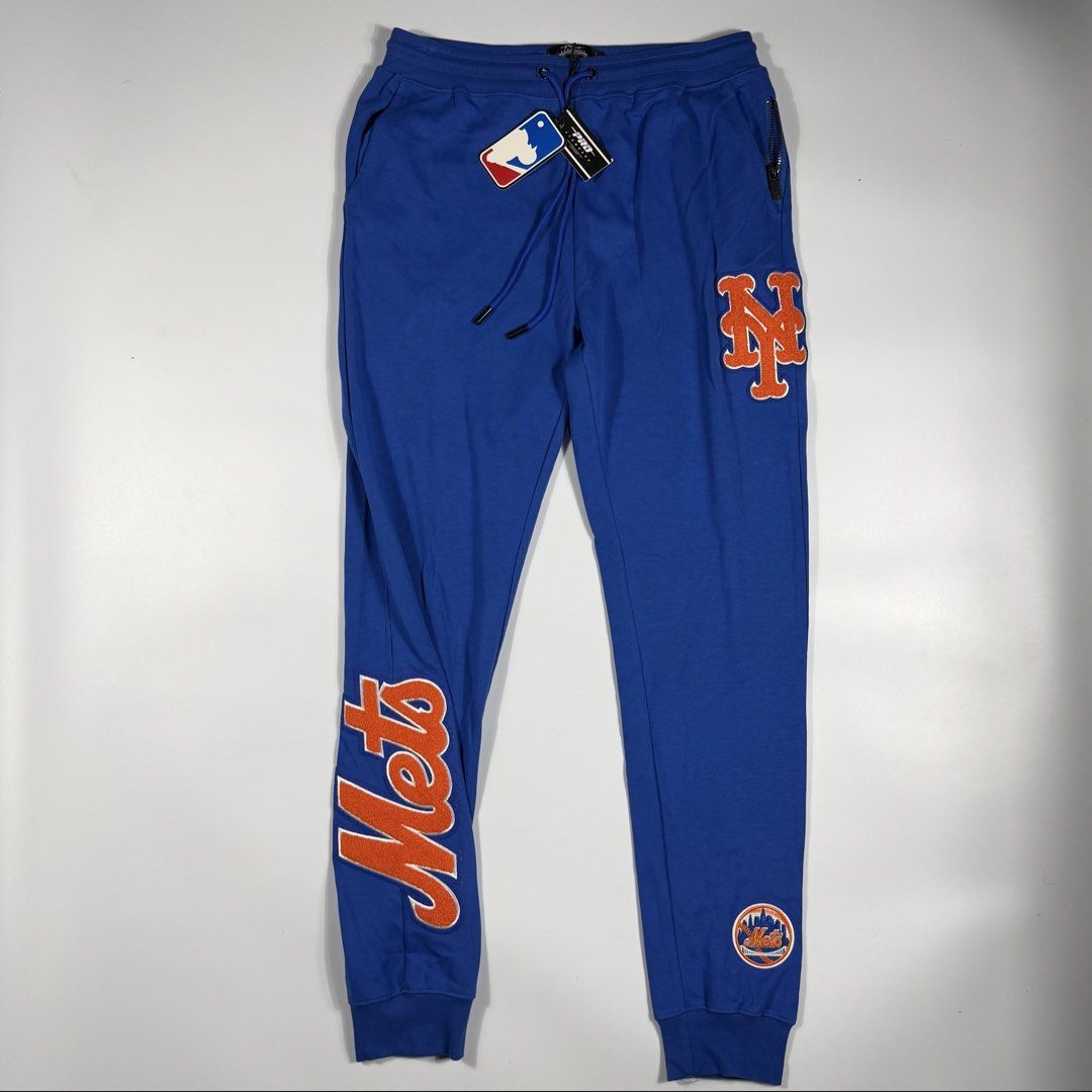 MLB Pro Standard New York Mets Sweatpants (Category: Joggers) located in Bacolod City. Submitted by freshstuff13 (Listing ID 1466717619, Image 1). Description: - Brand: Pro Standard (Officially Licensed MLB merchandise) - Team: New York Mets - Color: Royal Blue - Size: XL - Condition: Brand new with original MLB and Pro Standard tags attached - Design: Eye-catching orange and white chenille team logo patches on left thigh and right lower leg, plu