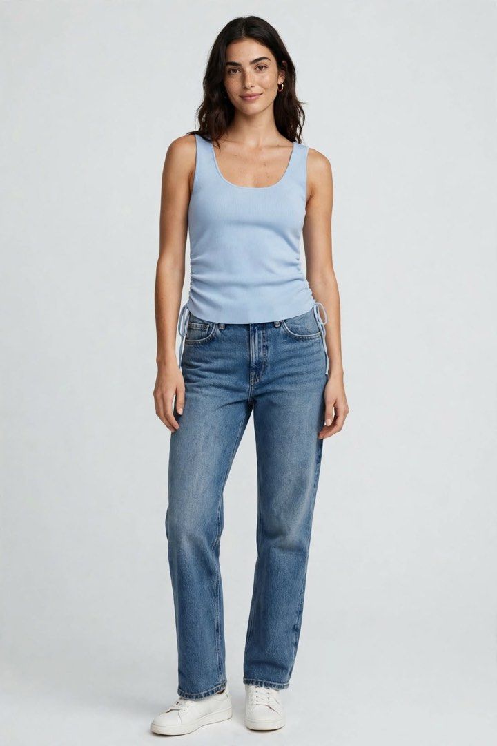 MNG Mango Ribbed Blue Tank Top with Drawstring Sides (Category: Sleeveless) located in Manila. Submitted by rutchemari68583 (Listing ID 1466580887, Image 1). Description: - Brand: Mango - Size: XS-Small - Color: Light blue - Material: Soft, stretchy knit - Design: Scoop front and back neckline, adjustable side drawstrings for a ruched look - Condition: Worn once or twice, great overall condition.