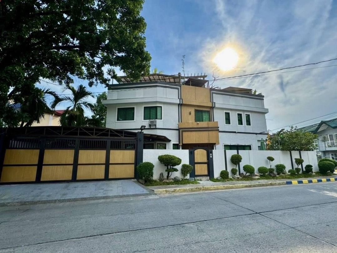 Modern Tropical House (Category: House & Lot) located in Manila. Submitted by blessielaceda (Listing ID 1466564699, Image 2). Description: Modern Tropical House in Meadowood Bacoor, Cavite. Featuring a ROOFDECK SKY GARDEN with a 360-degree view of the village overlooking SM Bacoor. It is located just beside the Village Church Immaculate Heart of Mary. The house is newly renovated and semi-furnished. Property Details: - Floor Area: 446 SQM - Lot A