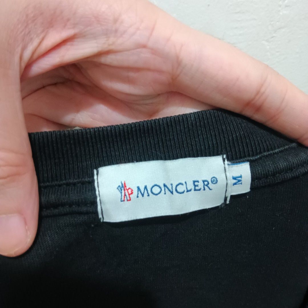 MONCLER Neck Spell Out Shirt (Category: Shirts) located in Caloocan City. Submitted by jaychingsss (Listing ID 1466637044, Image 3). Description: Moncler Shirt - 180 21x29 Color Rate: 9.5/10 Complete Tags Minor issue: mejo naka angat yung sa gilid ng rooster design check photo. Di naman malala kayo nalang dumiskarte NEED WASH.
