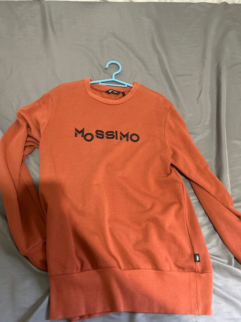 Mossimo Long Sleeve Sweatshirt (Category: Hoodies) located in La Paz. Submitted by adisaur (Listing ID 1466646360, Image 1). Description: Brand: Mossimo Item: Long-sleeve sweatshirt / pullover Color: Rust / Terracotta / Burnt Orange Features: Front Embroidered. Medium. Used once and tinambak nalang sa cabinet..