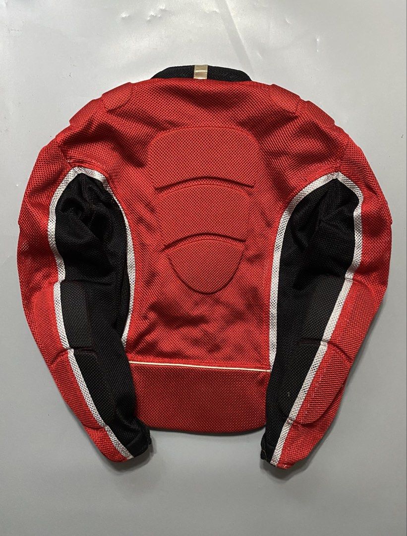 Motorcycle3000 By Pilot Red Mesh Riding Jacket Size L (Category: Coats, Jackets and Outerwear) located in Manila. Submitted by delunakenn94368 (Listing ID 1466695695, Image 2). Description: - Brand: Pilot - Size: L - Color: Bright red mesh with black side panels and reflective silver piping - Protection: Built-in shoulder padding and back protection panels - Features: Heavy-duty zipper closure, neck tab, and great airflow for hot weather riding -