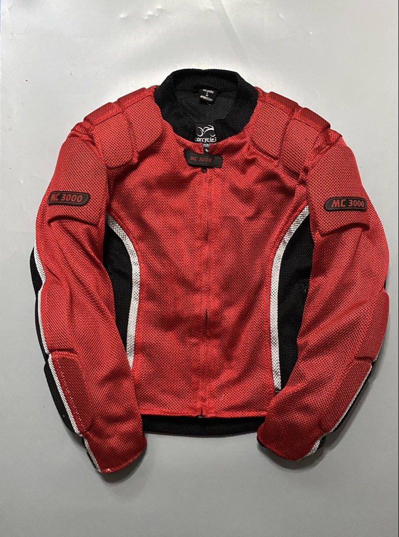 Motorcycle3000 By Pilot Red Mesh Riding Jacket Size L (Category: Coats, Jackets and Outerwear) located in Manila. Submitted by delunakenn94368 (Listing ID 1466695695, Image 1). Description: - Brand: Pilot - Size: L - Color: Bright red mesh with black side panels and reflective silver piping - Protection: Built-in shoulder padding and back protection panels - Features: Heavy-duty zipper closure, neck tab, and great airflow for hot weather riding -