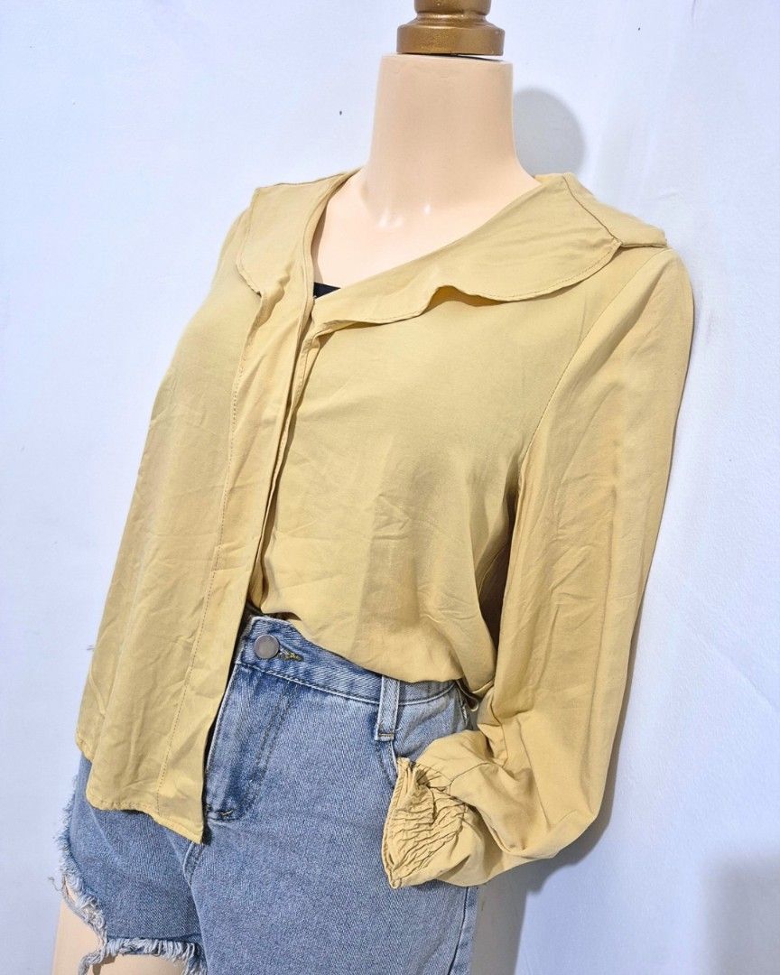 Mustard Ruffle Collar Blouse | M-L (Category: Longsleeves) located in Cabanatuan. Submitted by _erboutique (Listing ID 1466675803, Image 2). Description: • Warm mustard yellow blouse with sweet ruffle collar • Soft & lightweight fabric • Size M–L | Shoulder 16" | Bust 38" | Length 21½" • Great condition, easy to dress up or down.