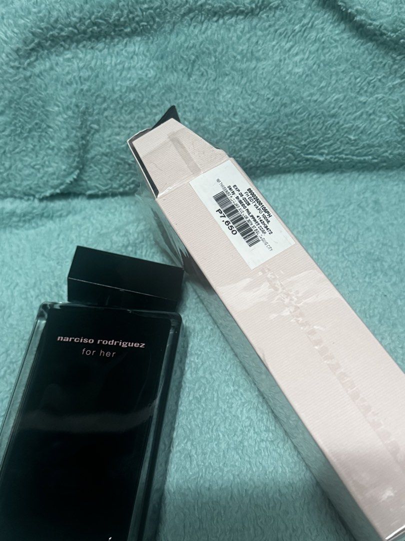 Narciso Rodriguez For Her Eau de Toilette 100ml (Category: Fragrance & Deodorants) located in Mandaluyong City. Submitted by maejoselle (Listing ID 1466765163, Image 3). Description: - Item: Narciso Rodriguez For Her Eau de Toilette - Size: 100ml, used about less than 20 sprays - Packaging: Original box included, still wrapped in plastic - Authenticity: Comes with Shiseido Philippines sticker at the back .