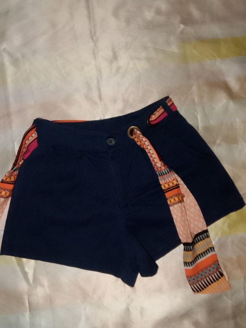 Navy Blue Short with belt (Category: Shorts) located in Caloocan City. Submitted by thriftjz (Listing ID 1466679565, Image 1). Description: -waist: 24 -fabric: semi denim -adjustable/removable satin belt loc: South Caloocan.