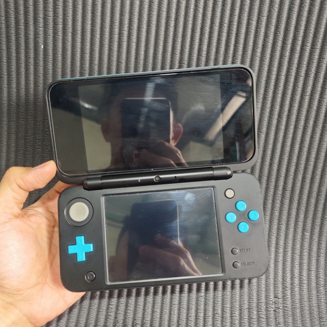 New 2ds XL Blue black (Unit ONLY) with Issue Pls read description (Category: Nintendo) located in Quezon City. Submitted by shopme_gadget30 (Listing ID 1466614926, Image 3). Description: kindly read the details take your own risk No return No refund issue: ayaw magpower on (Un lang) pero nagchacharge sya with the solid orange light. hindi namamatay ung light when charging console itself makinis. no crack on the screen. and good as new sa appearan