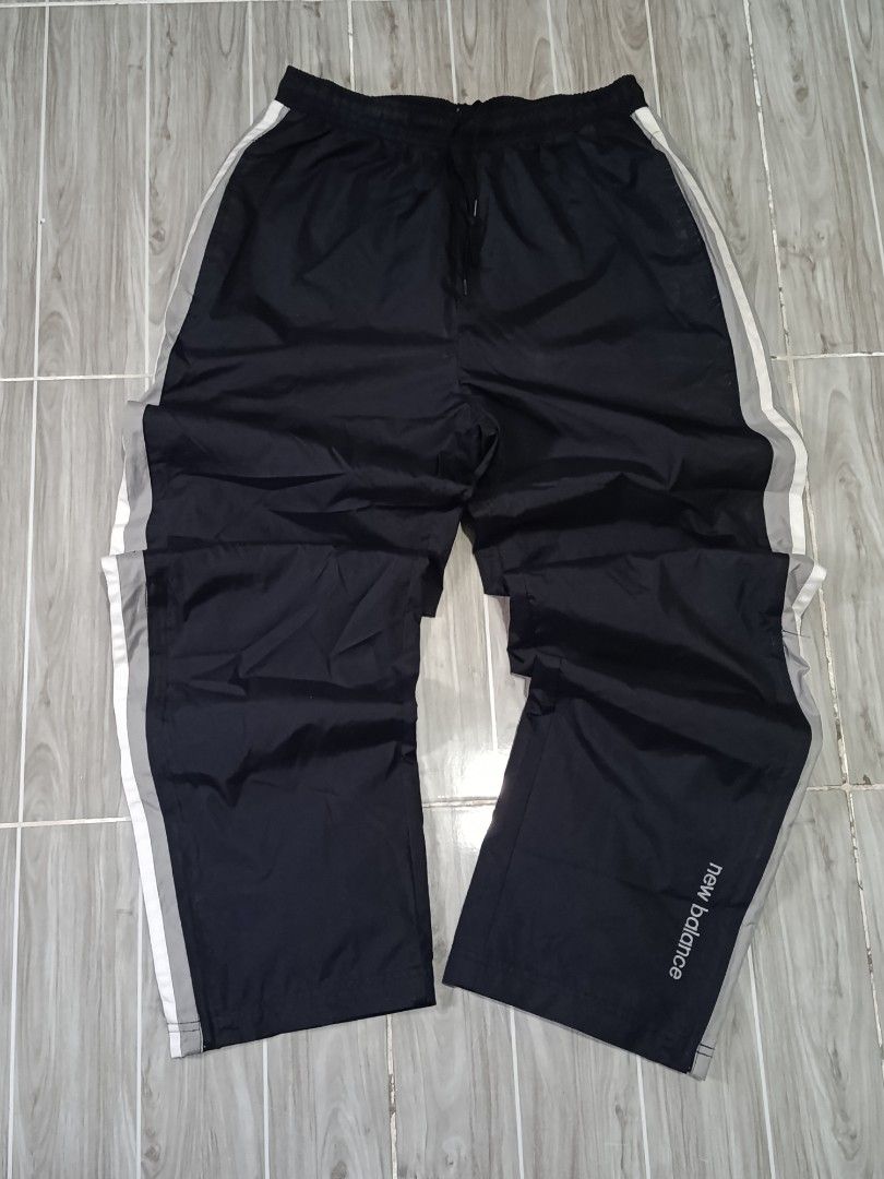 NEW BALANCE NYLON JOGGING PANTS (freeshipping) (Category: Activewear) located in Quezon City. Submitted by gyl-stop (Listing ID 1466723369, Image 1). Description: free shipping zipper 29-36 x 41.5 very good condi cr: 9.5/10 issue: none.