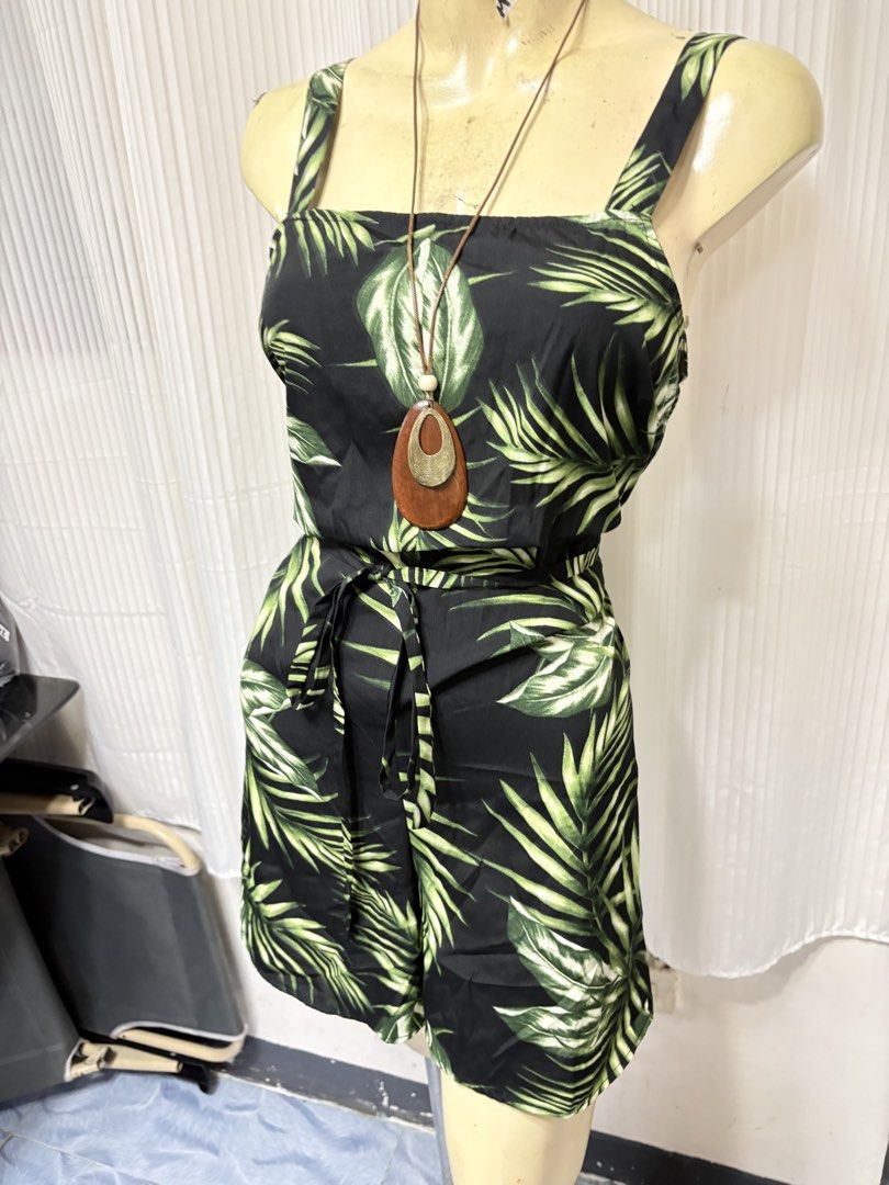New Look Tropical Palm Print Romper (Category: Rompers) located in General Trias. Submitted by crissy9053136 (Listing ID 1466695965, Image 2). Description: - Brand: New Look - Style: Palm leaf print romper with square neckline and thick straps - Size: UK 12 / EU 40 / US 8 - Extras: Includes a matching waist tie belt for a flattering fit - Fabric: Light and breezy material, ideal for warm weather and vacation vibes - Condition: Excellent.