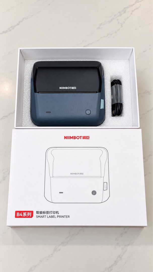 NIIMBOT B4 Series Smart Label Printer (Category: Printers, Scanners & Copiers) located in Mabalacat. Submitted by shngttuc (Listing ID 1466588244, Image 1). Description: RUSH! For Sale: NIIMBOT B4 Thermal Printer Used once lang, with free roll pa sa loob. No ink needed, Bluetooth ready. Pang waybill / shipping label / sticker. Complete with box. RFS: di nagagamit ₱3,500 only (Orig price 5,699) Magalang, Pampanga PM if sure buyer..
