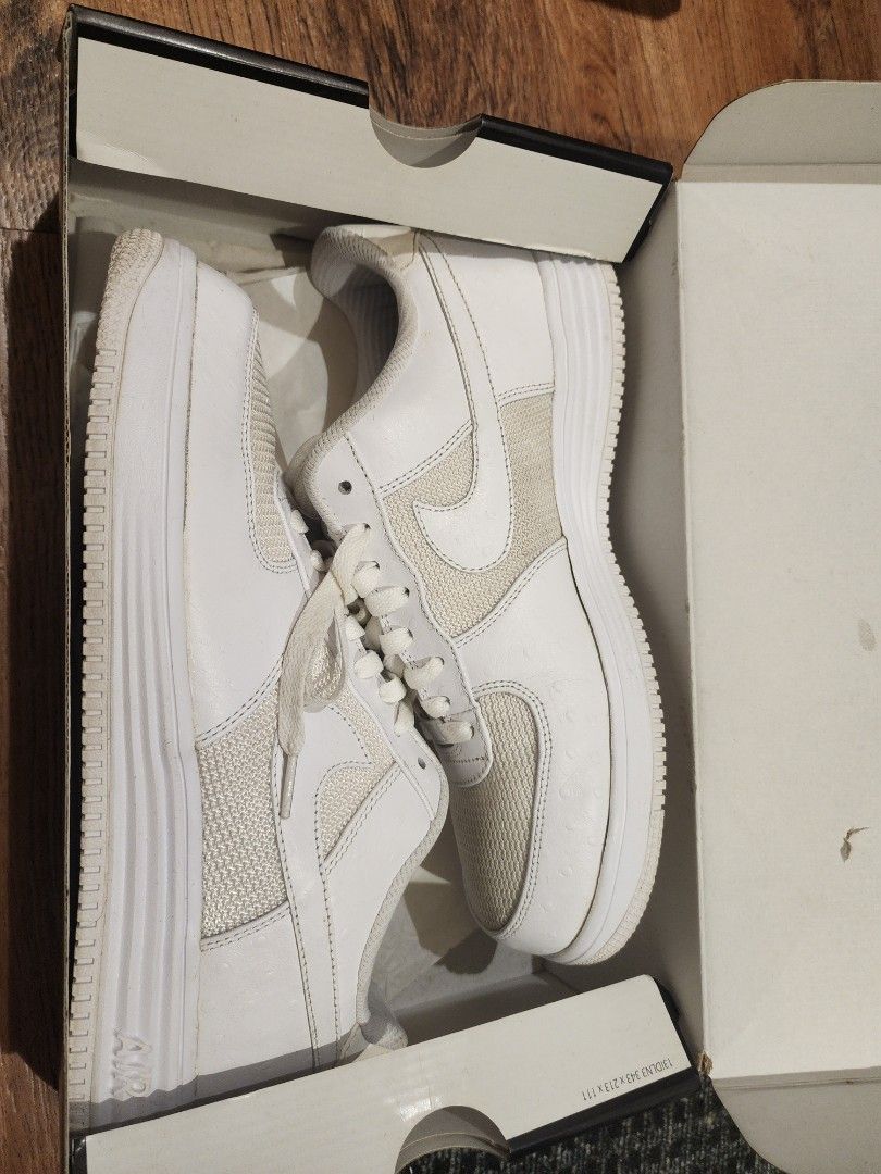 Nike Air Force 1 Low White ID (Category: Sneakers) located in Manila. Submitted by kg613 (Listing ID 1466773389, Image 3). Description: - Model: Nike Air Force 1 (Nike ID) - Colorway: White with purple embroidered heel branding - Material: Mesh panels and ostrich texture leather overlays - Inclusions: AF1 metal lace dubraes and original Nike ID box - Condition: Clean overall with minimal wear visible - Meet-ups or shipping available across PH.