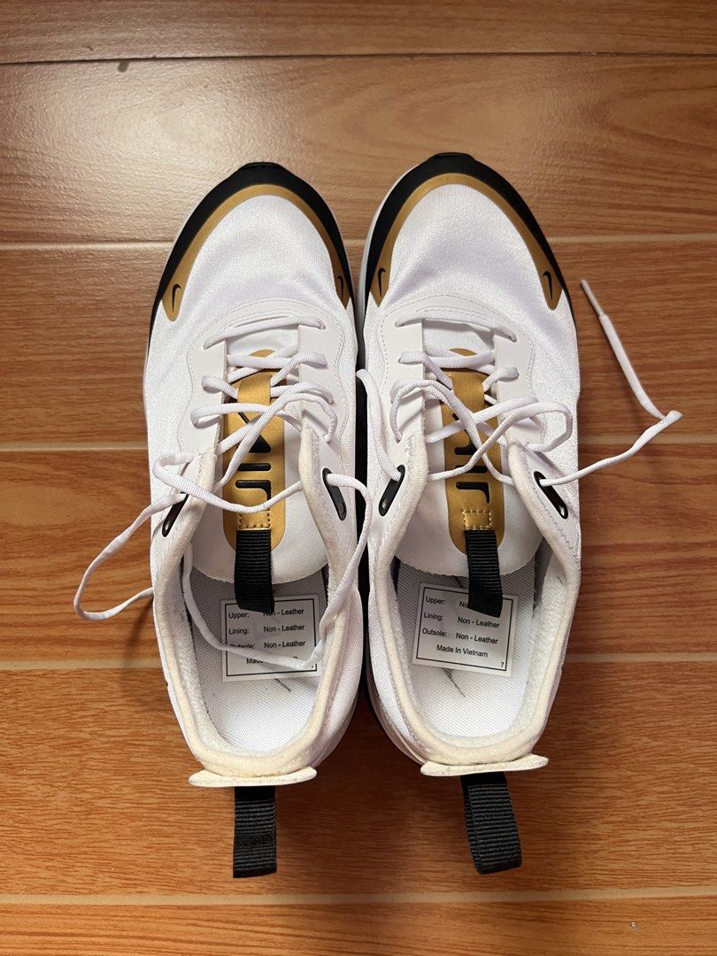 Nike Air Max Dia (Category: Sneakers) located in Cavite. Submitted by gelahhhh (Listing ID 1466589057, Image 1). Description: Brand: Nike Model: Air Max Dia Colorway: White upper with black panels and gold accents Features: Visible Air Max heel cushioning, convenient black pull tabs on tongue and heel Used once Size: US 7.5 / UK 5 / EUR 38.5 / 24.5 cm Condition: Clean uppers and soles with minimal wear. Minimal flaws. No box Negotiable Rfs: Declu