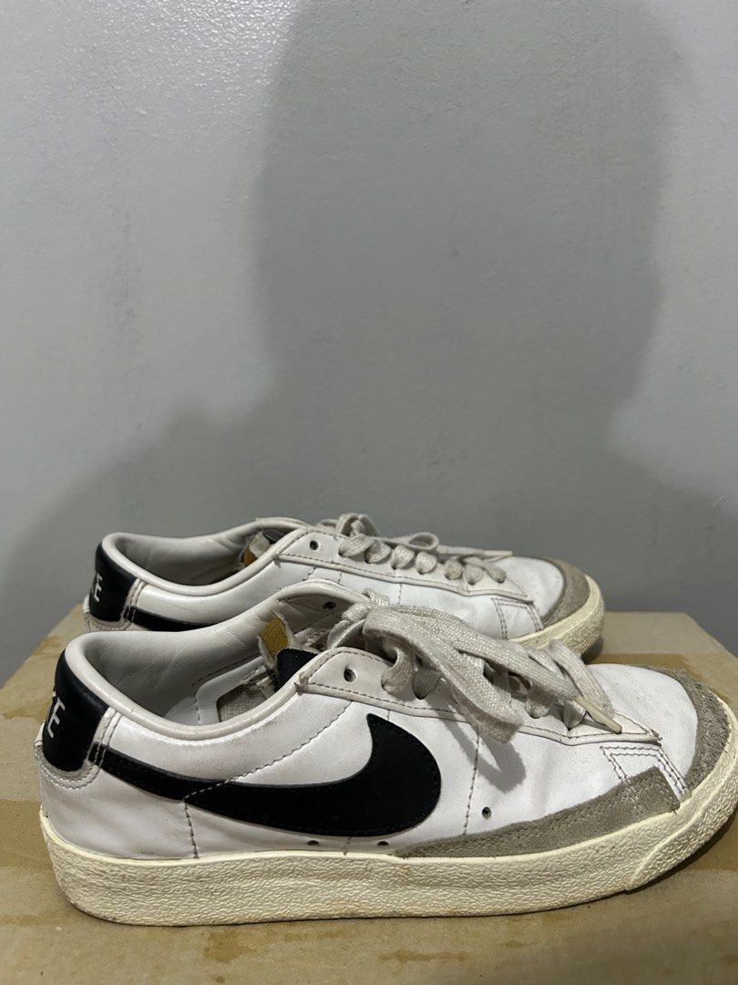 Nike Blazer Low '77 Vintage White Black (Category: Sneakers) located in Manila. Submitted by dtbalanza109684 (Listing ID 1466692761, Image 3). Description: - Model: White leather sneakers with black swoosh and grey suede toe overlays - Size: US 7 / UK 4.5 / EUR 38 - Style: Low-top, versatile everyday sneaker - Condition: Normal creasing on leather uppers, slight yellowing on midsoles from wear - Inclusions: Comes with original laces - Ready for a