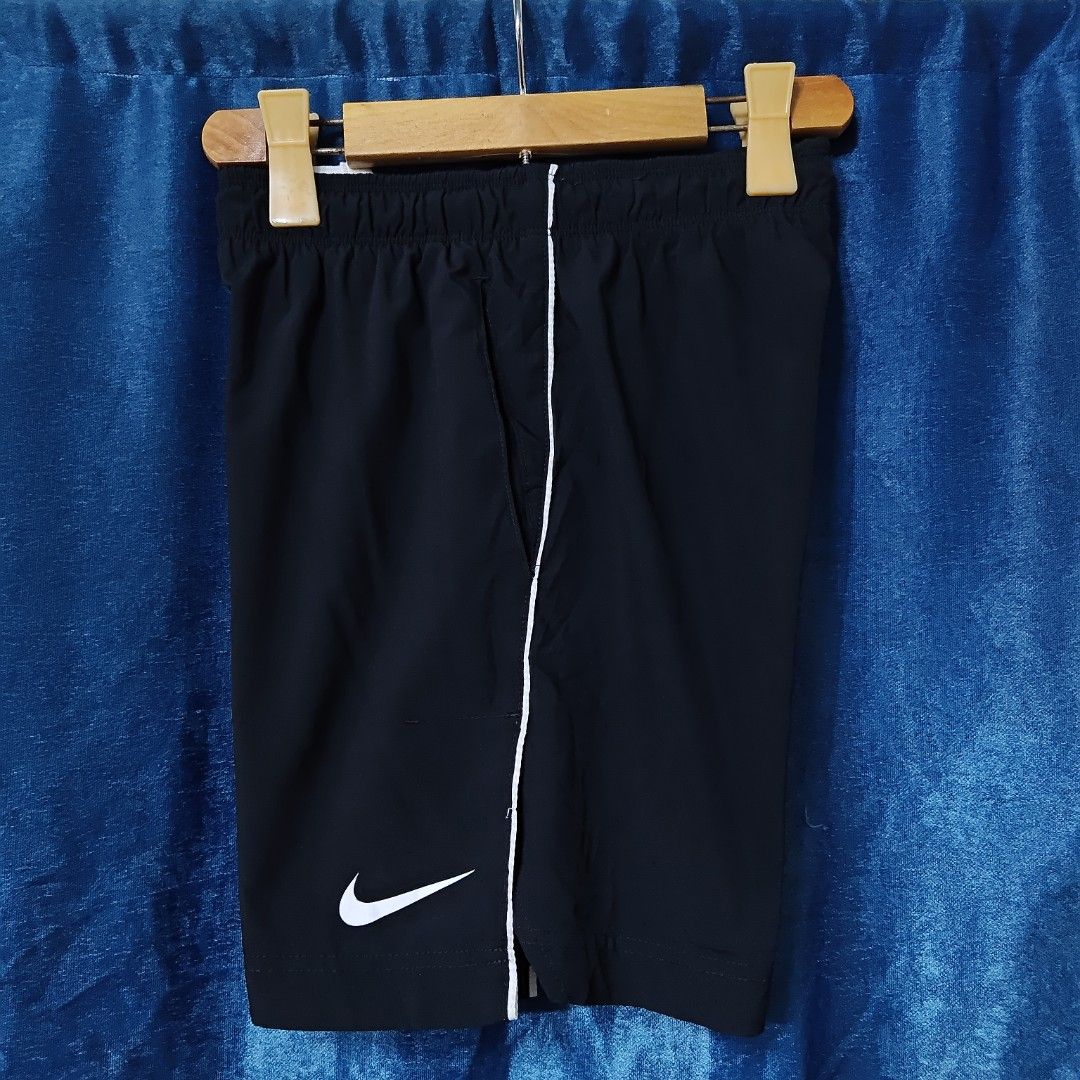 NIKE DRI FIT WOVEN SHORT (Category: Shorts) located in Makati City. Submitted by upcycled.closeth (Listing ID 1466580320, Image 3). Description: - Authentic Nike product - Black, Nylon short - Size: small to medium (men's) - Weistline: 29-32 - Length: 16 - Authentic - flaws: no flaws - Excellent condition - Need wash, fresh from bale - Features design of Nike woven short - Material: 100% nylon !!STILL NEGOTIABLE!!.