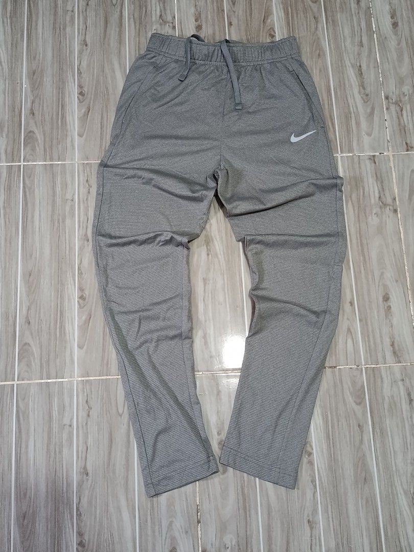 NIKE DRIFIT PANTS (freeshipping) (Category: Activewear) located in Quezon City. Submitted by gyl-stop (Listing ID 1466720359, Image 1). Description: free shipping 24-28 x 36 excellent condi cr: 9.8/10 issue: none.