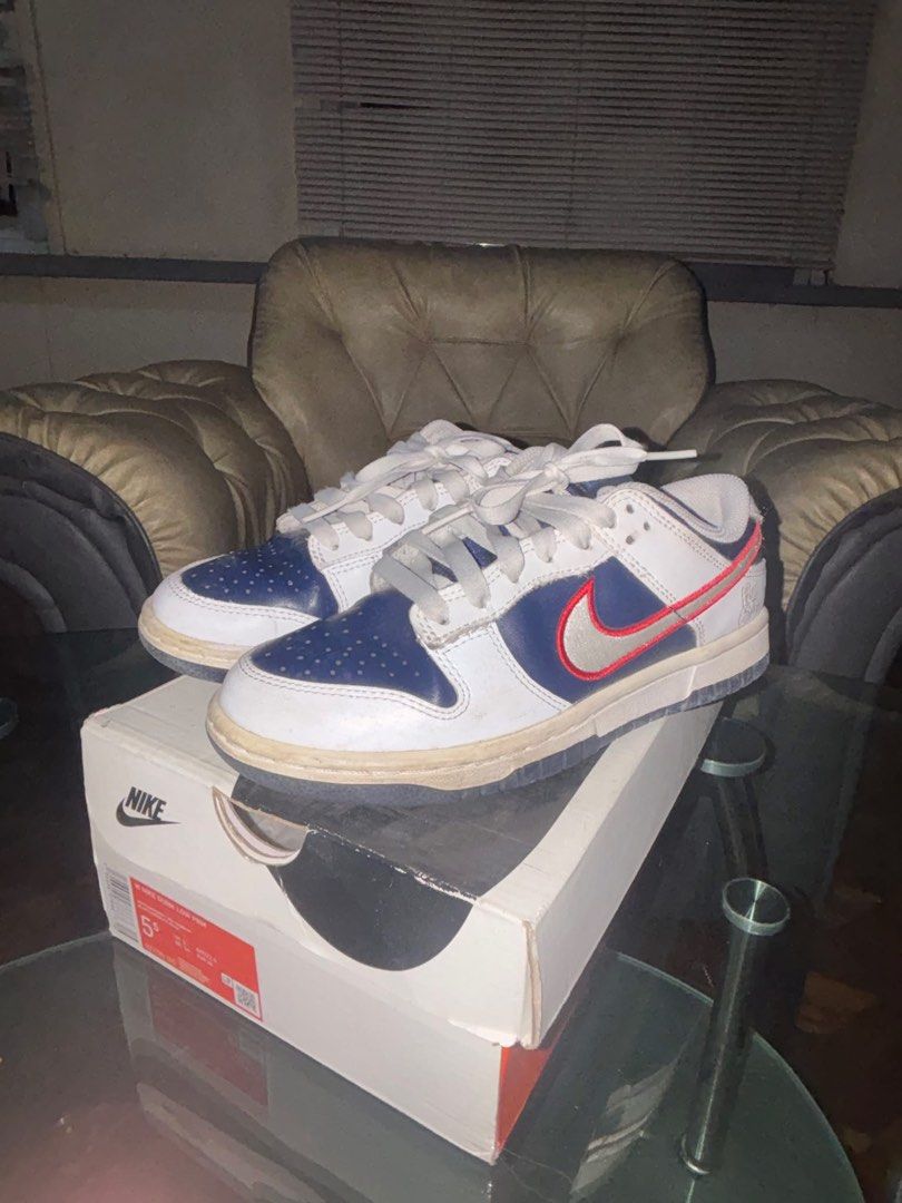 Nike Dunk Low PRM White University Red Obsidian (Category: Sneakers) located in Cavite. Submitted by ohitsaj (Listing ID 1466673022, Image 1). Description: - Model: Nike Dunk Low PRM - Colorway: White / University Red / Obsidian - Size: US 5.5 Women's / UK 3 / EUR 36 - Materials: Suede and leather upper with layered swoosh outline - Inclusions: Original box included - Condition: Soles show minor wear and scuffing from previous use.