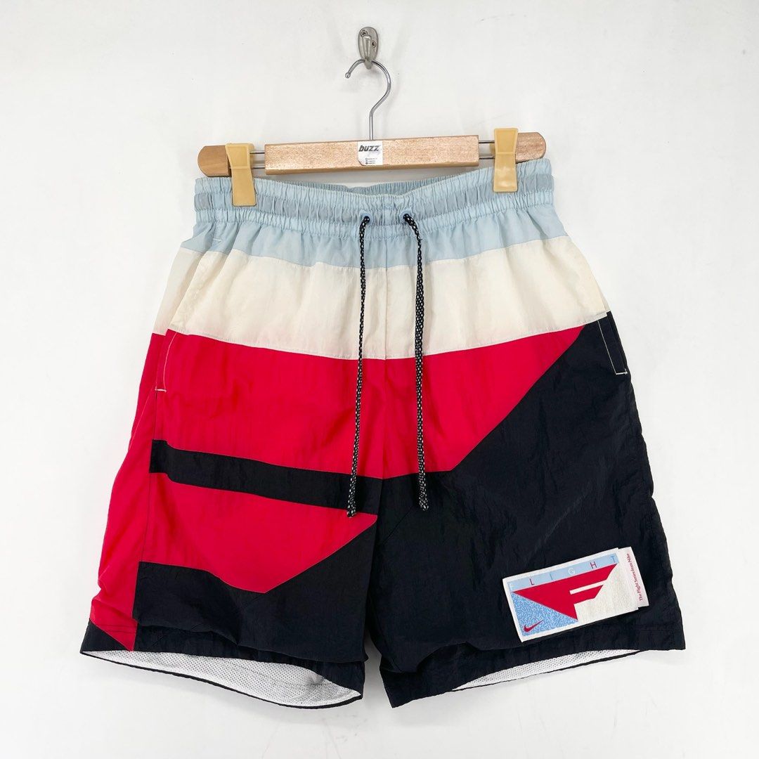Nike Flight Contrasting Color Drawstring Shorts (Category: Shorts) located in Manila. Submitted by buzz.garments (Listing ID 1466735142, Image 1). Description: Size: Large on tag Dimensions(inches) -Waist/Width: 30”-38” (Strechable) -Hip: 23” -Front Rise: 13” -Thigh: 13” -Inseam: 8” -Outseam/Length : 20” -Leg Opening: 12” need wash - color may vary due to lighting. please manage your expectations-minimal and unseen flaws must be considered..