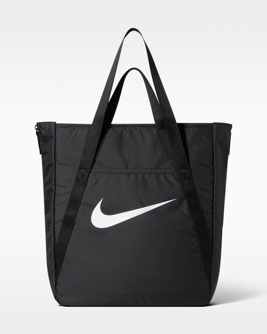 Nike Gym Tote bag (28L) (Category: Tote Bags) located in Quezon City. Submitted by mackoyusgoods (Listing ID 1466621344, Image 1). Description: No matter what your training journey is, this tote is made to handle it. Multiple deep pockets line the inside of this bag, both open and zipped for extra security. The front and back features pockets for the small things you want easy access to. And, the size of this tote is deceptive—the sides feature e