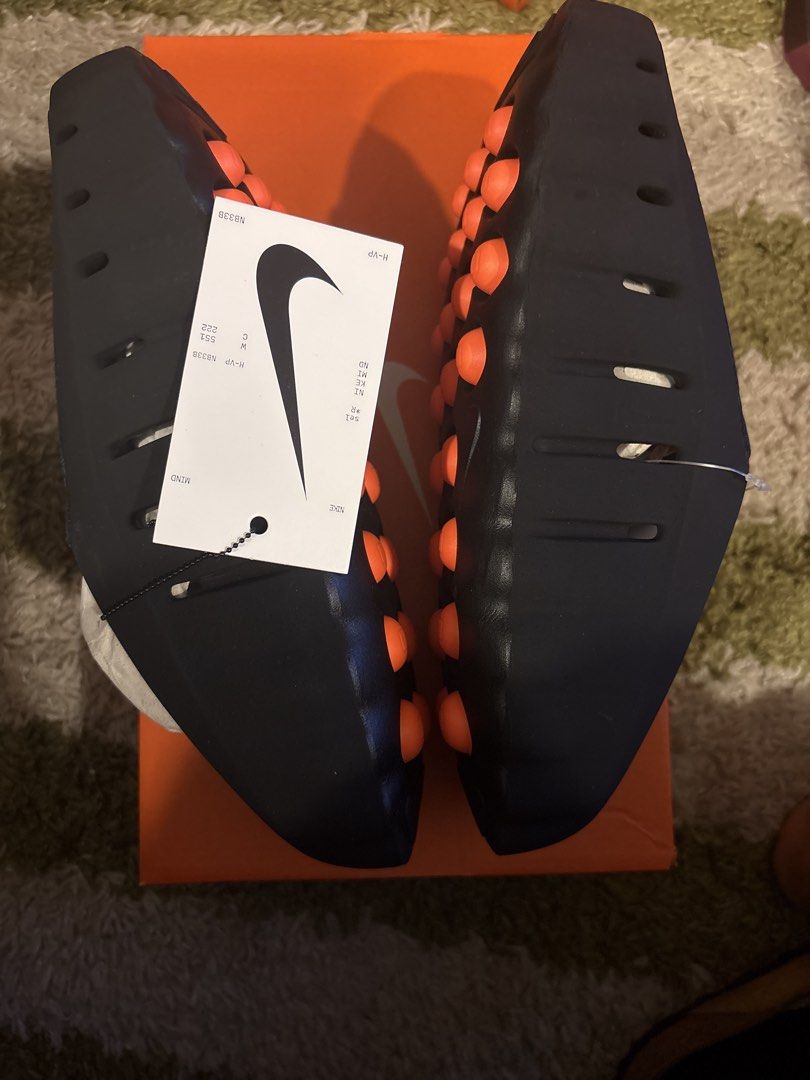 Nike Mind 001 Black Size 9 (Category: Sneakers) located in Pasig City. Submitted by ripescobar (Listing ID 1466687913, Image 2). Description: - Model: Nike Mind 001 Mules - Colorway: Black with striking orange accents - Size: Men's US 9 / Ready to wear - Design: Slip-on mule with breathable perforated uppers and unique studded outsole detailing - Condition: Brand new with original orange Nike box, tissue paper stuffing, and attached store tags.