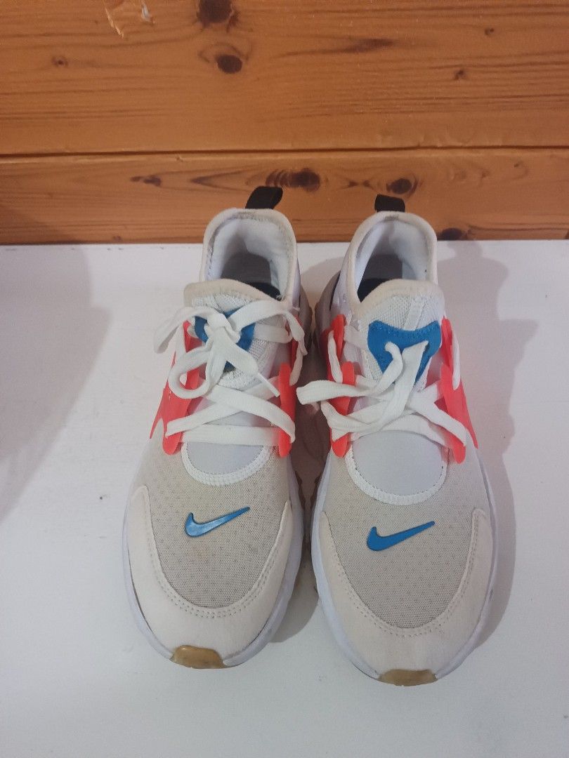 Nike React Presto Kids Shoes Size US 4Y (Category: Babies & Kids Fashion) located in Rizal. Submitted by ethelfranc54595 (Listing ID 1466591310, Image 1). Description: - Brand: Nike React Presto - Colorway: White with bright orange and blue accents - Size: US 4Y / UK 3.5 / EUR 36 - Features: Comfortable foam soles with rubber pods and convenient heel pull tabs - Condition: Normal signs of wear on uppers and soles; laces are clean - Perfect for da